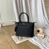 En-ji Moya Handbag - Black