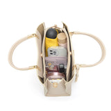 En-ji Jira Handbag - Almond