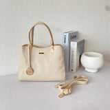 En-ji Jira Handbag - Almond
