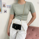 En-ji Taemi Slingbag - Black