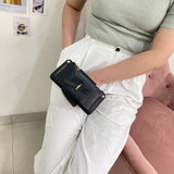 En-ji Taemi Slingbag - Black