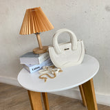 En-ji Sebin Slingbag - Ivory