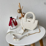 En-ji Sebin Slingbag - Ivory